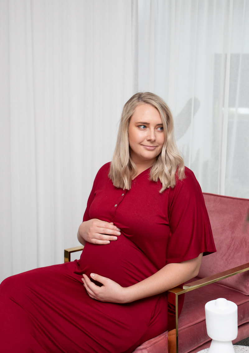 The Comfort Mama dresses for pregnancy, labour, breastfeeding and beyond. Harper Ruby Maroon Red.